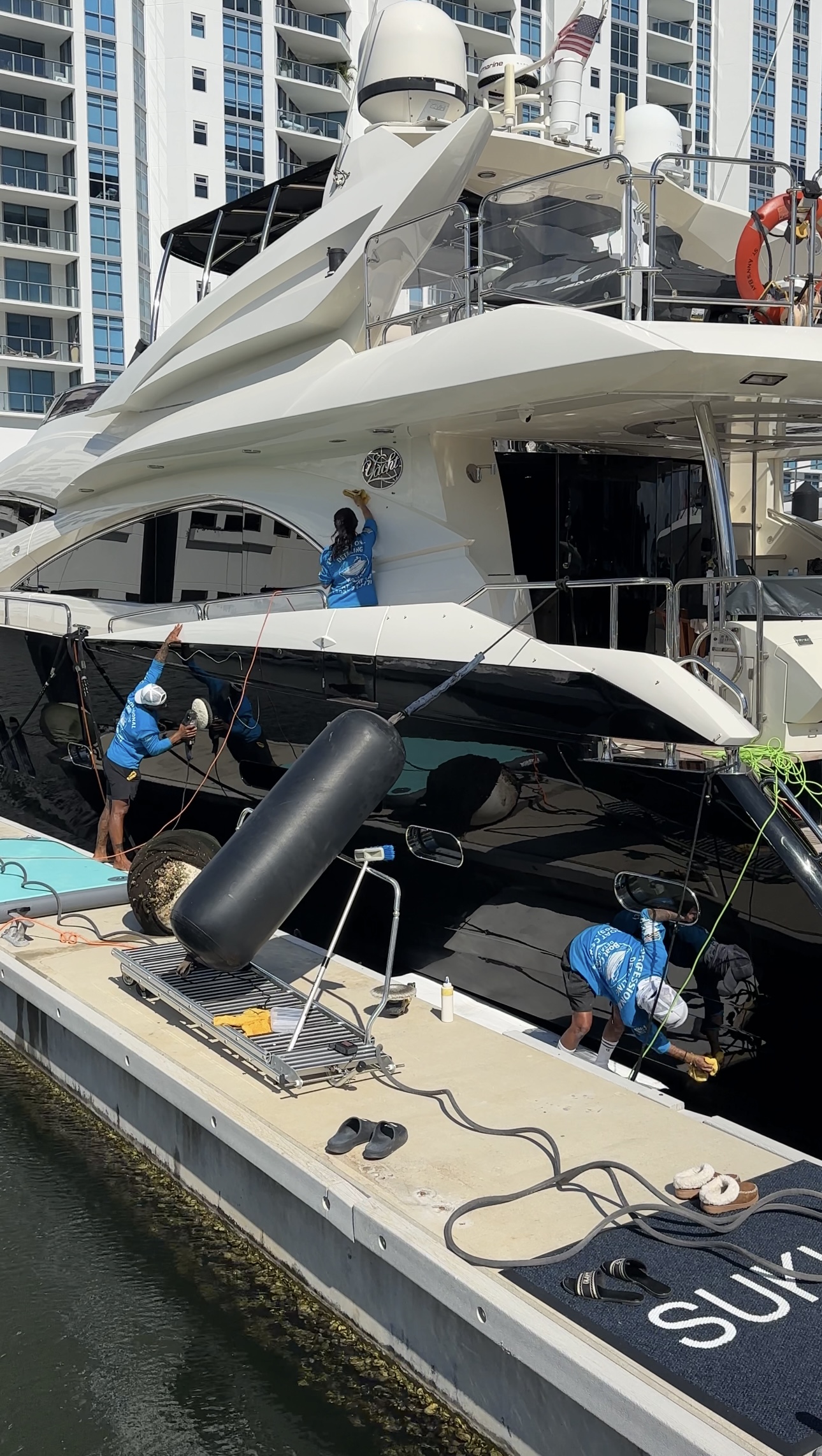 Professional yacht detailing at marina